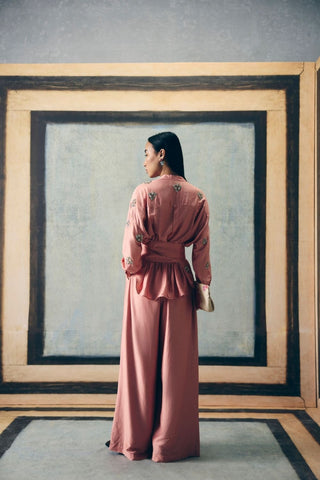 Women posing in a Dusky pink (Mauve) co-ord set featuring a delicate embroidered shirt, paired with pants and tie up belt offering a clean and elegant look perfect for effortless styling. Designed by Ease. 
Pefect dress for parties, formals, evening soiree, office, everyday, formal ceremonial events, casual, holiday vacation or for resort.