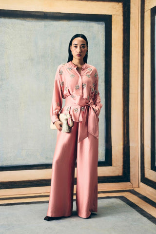 Women posing in a Dusky pink (Mauve) co-ord set featuring a delicate embroidered shirt, paired with pants and tie up belt offering a clean and elegant look perfect for effortless styling. Designed by Ease. 
Pefect dress for parties, formals, evening soiree, office, everyday, formal ceremonial events, casual, holiday vacation or for resort.