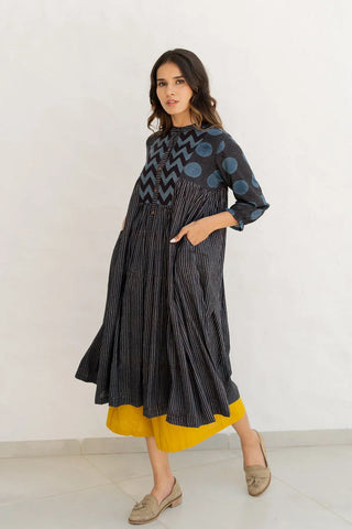 Amra black striped and indigo cotton side pleat kurta, boho hand block print - front view with pockets. Women's printed midi kurta set by Vrajbhoomi featuring a contemporary silhouette and coordinated bottoms, blending modern Indian fashion with everyday comfort.