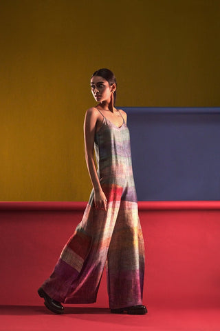 A two-piece dupion silk set comprised of abstract geometric and floral print in playful color compositions and parallel pants with fusion textiles. Designed by Clos.
