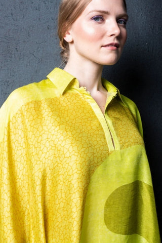 Close up of silk kurta and pant set in abstract print, perfect for stylish evening gatherings.