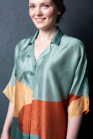 Close up of Geometric abstract dupion silk co-ord set for chic work-to-party styling.