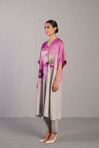 Elegant pastel grey kurta set with artistic colour detailing suited for intimate festive gatherings and cultural events.