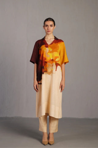 Front look of Ochre and brown modern kurta set designed for contemporary occasion wear, featuring wide collar detailing, straight pants. Styled for creative office wear, travel and evening gatherings. Designed by clos.