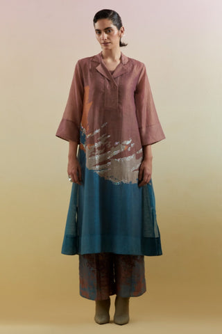 Brown and blue linen silk kurta set with slub cotton inner, Flow print, flared sleeves, and wide leg trousers. Contemporary ethnic women's wear for festive gatherings and cultural events. Designed by Clos.