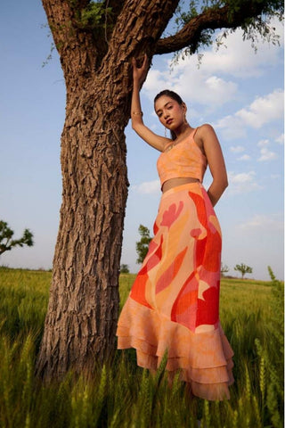 Two-piece set featuring abstract print bustier and straight frilled skirt in sustainable Japanese plant-based fabric. Perfect for casual outings, brunches, summer wear. Designed by Clos. 