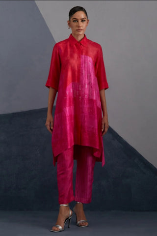 Vermilion and Fuchsia dupion silk tunic set with layered circular cut hemline, Designer silk outfit suitable for cultural celebrations and evening events. Designed by clos.