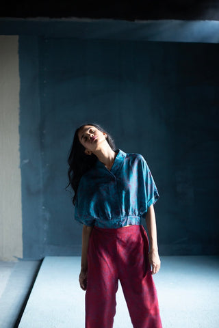 Women’s dupion silk co-ord set with floral print blouse and straight-fit pants, elegant daytime wear.