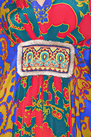 close up of Royal Paisley Pleated Kaftan with Hand Bead Embroidery. elegant and vibrant fusion wear for women.