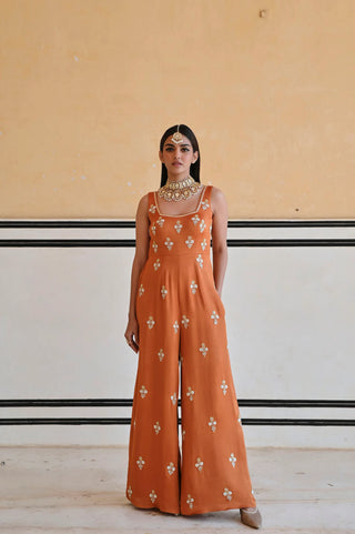 Copper floral butti embroidered flared jumpsuit with a square neckline, offering a refined contemporary ethnic ensemble for festive events, celebrations and elegant occasion dressing.