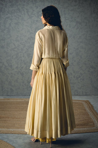 Model psing in Ivory pocket embroidery midi maxi dress showing back.