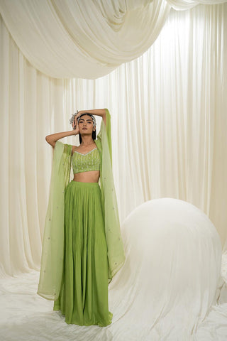 Chic lime-colored jacket sharara set with embroidered bustier and long jacket, designed for festive and wedding celebrations.