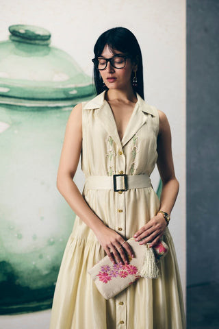 Chic ivory collared dress with intricate yoke embroidery and a flattering tie-up waist belt. Ideal for minimal, polished looks, offering versatility for both daytime events and relaxed occasions.