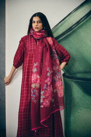 Wine embroidered blazer paired with tailored pants, layered over a maroon checked kurta and matching printed pants. A refined fusion look that blends structure with effortless coordination and style.