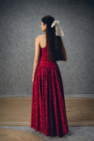Back look of maroon printed check corset dress with embroidery and soft gathering, elegant women’s summer wear perfect for vacations, brunch looks, and comfortable everyday outfits.