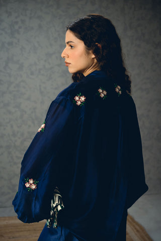 Back look of elegant navy blue set with a lightly embroidered shirt and solid pants. Designed for a refined and minimal look, ideal for casual outings, workwear, or understated sophisticated styling.
