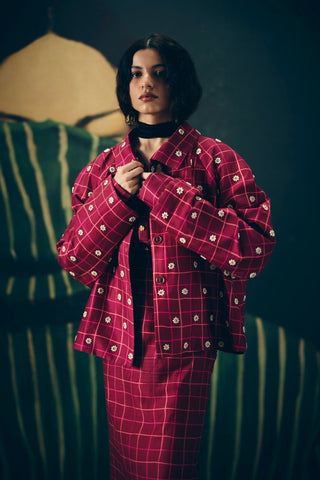 Stylish maroon skirt set with classic checks, paired with an embroidered bustier and matching shirt. A sophisticated and balanced look perfect for brunch, outings, or semi-formal events.