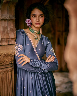 Woman close up look in a blue ethnic traditional anarkali embroidered dress. A perfect dress for ethnic parties, special occasions, wedding ceremonies or festival gathering for pooja or celebration nights.