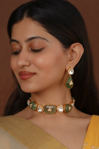 Designer green contemporary necklace set crafted in gold finish with matching earrings, suitable for festive occasions, party wear and modern ethnic looks.