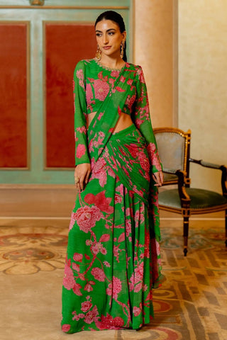 Green and pink floral pre stitched georgette saree with full sleeve blouse. Perfect designer outfit for festive occasions, mehendi ceremonies, weddings, parties, bridal wear. Designed by Paulmi and Harsh.