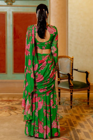 Back look of green and pink floral pre stitched georgette saree with full sleeve blouse. Perfect designer outfit for festive occasions, weddings, parties, bridal wear.