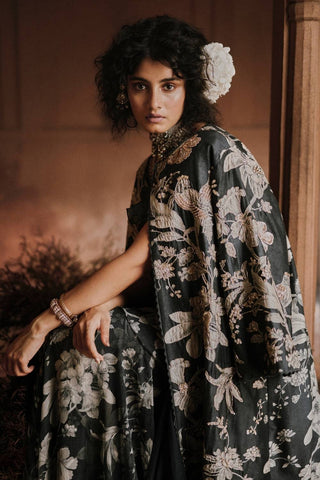 Women’s navy blue pre draped saree with bird motif print and hand embroidered pallu, paired with blouse, perfect for festive occasions, weddings, and contemporary ethnic fashion.