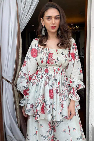 Aditi Rao Hydari, stunning in off–white bird printed peplum with bishop sleeves and gather detailing, paired with the same print palazzos. Perfect of Summer, Resort wear, brunch, evening parties. Designed by Paulmi and Harsh.