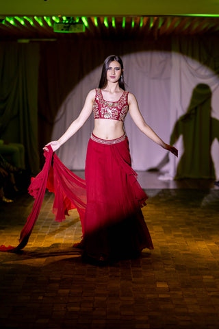 Runway model flaunting crimson red chiffon ruffle pre-drapped pre-stitched saree at Australian Fashion Grandeur runway.