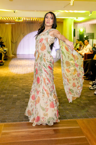 Model showing pallo of chintz and bird printed pre-draped saree with belt and blouse in off-white colour at Australian Fashion Grandeur runway