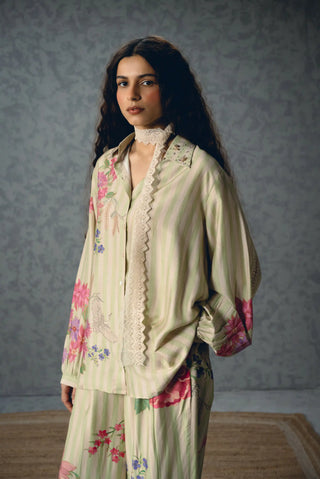 Aika relaxed shirt and trouser outfit featuring front-button styling, pleated pants and delicate floral stripes for an effortless contemporary daytime look.