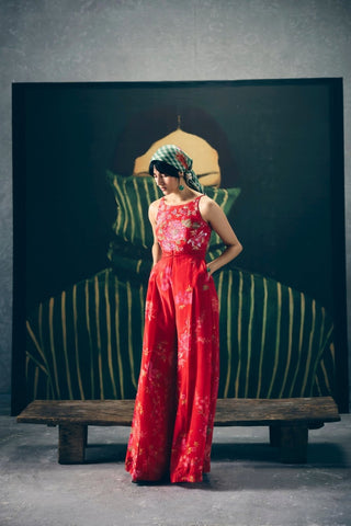 Alaya red floral jumpsuit combines graceful embroidery with a fluid modal silk silhouette, making it an effortless luxury choice for dinners, parties, and evening occasions.