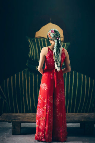 Back look of Alaya floral embroidered jumpsuit blends modern tailoring with luxurious modal silk, making it a graceful statement outfit for cocktail parties and evening celebrations.
