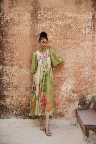 Lightweight floral placement printed maxi dress in breathable habutai silk with hand-embroidered detailing — a chic choice for resort wear and summer getaways.