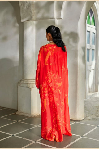 Back look of the kaftan highlighting colourful printed motifs and graceful lightweight silhouette.