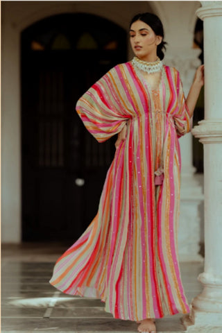 Klava Striped Kaftan in crepe fabric featuring multicolour stripes, sequin embroidery, mirror work, dabka detailing, and handcrafted tassels. Perfect for festive gatherings, resort vacations, destination celebrations, and special occasions.