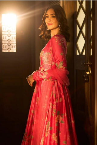 Celebrity-inspired blooming pink floral Anarkali worn by Mrunal Thakur, featuring intricate antique sequin, mirror, and resham handwork with a net embroidered dupatta.