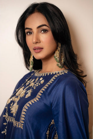 Sonal Chauhan Close up shot in blue chiniya silk kurta set with antique gold anar motif hand embroidery on the yoke and coordinated embroidered pants -ideal for festive occasions.