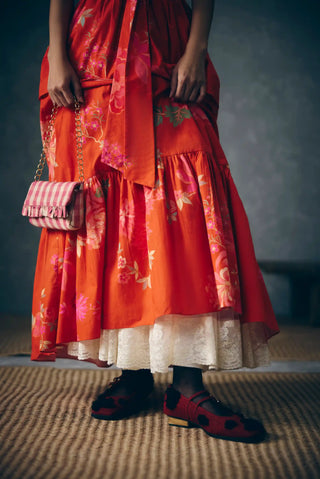 Selora floral poplin maxi by Paulmi and Harsh styled for resort-inspired dressing, combining an earthy rust-orange palette with a feminine full-length silhouette.