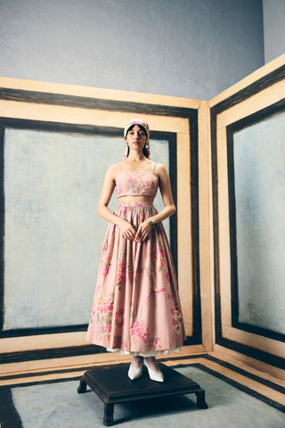 Alina pink skirt set featuring an embroidered bustier, floral printed skirt, and sheer organza shirt, creating a sophisticated designer ensemble for celebrations, parties, and elegant evening occasions.