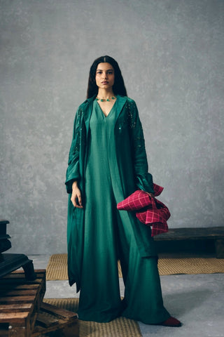 Emerald Green Wasabi jumpsuit features a convenient back zip and side pockets, complemented by an embroidered organza jacket, creating a stylish luxury outfit for evening and occasion wear.