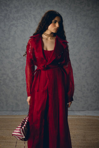 Nami three-piece occasion set combining a burgundy organza jacket, silk bustier and matching pants for an elevated contemporary outfit suited to evening events and celebrations.