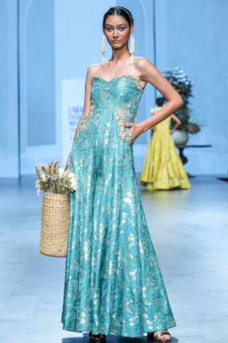Elegant one-piece jumpsuit with floral embroidered accents, structured silhouette, and modern cocktail-ready styling.