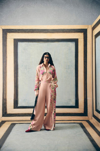 Elegant pink two-piece outfit crafted in soft poplin fabric with placement print and modern relaxed silhouette. Perfect for casual outings, vacation wear, brunch styling, and elevated daywear looks.