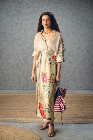 Designer shirt and skirt ensemble with relaxed tailoring, printed accents, and sophisticated wrap-around styling. Perfect for vacations, brunch outings, resort wear, and elevated daytime fashion.