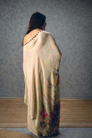 Back look of elegant ivory coord set crafted in smooth Japan satin with delicate placement print and fluid drape.