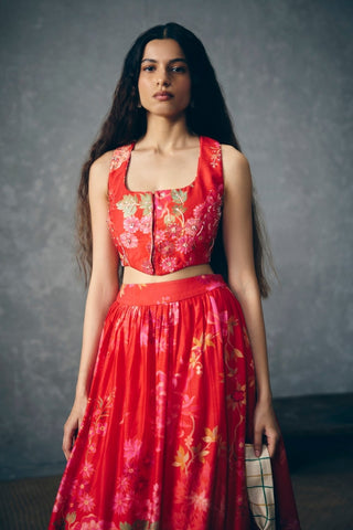 Detailed close-up of printed embroidery on luxurious chiniya silk fabric with elegant artisanal detailing.