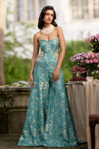 Blue Russian jacquard jumpsuit featuring delicate floral hand embroidery on pockets and yoke with elegant strapless styling.