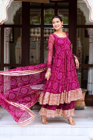Plum Bandhani Anarkali suit in georgette with gota patti work, paired with cotton pants and georgette dupatta, women’s ethnic wear, fully stitched festive and wedding outfit.