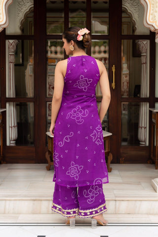Back look of Pomcha Bandhej cranberry suit set crafted in georgette with dupatta, fully stitched elegant ethnic wear featuring traditional tie dye print, lightweight texture, and graceful festive appeal.