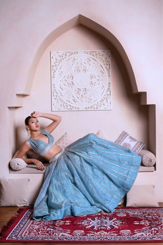 Powder blue silk lehenga choli with gota patti work in cosmos silk by Ghazal, women’s designer lehenga set, perfect for weddings, festive occasions and traditional celebrations.